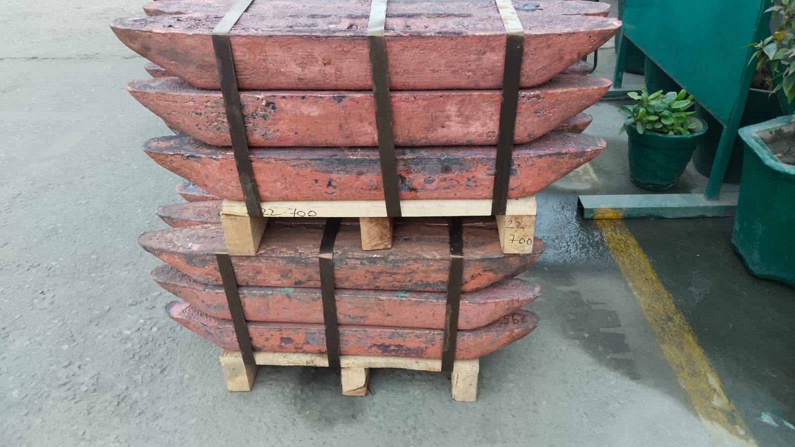 Copper ingots manufactured by Attero, stacked and strapped for institutional dispatch